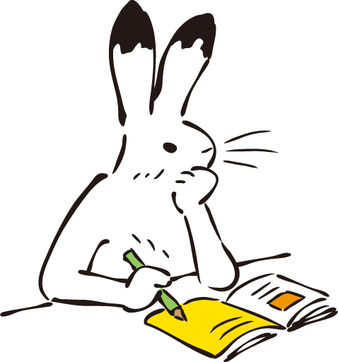 本を読みながら考え込むウサギ