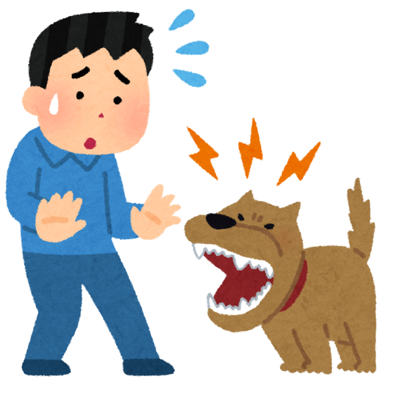 犬がワンワン吠えている様子に動揺している男性